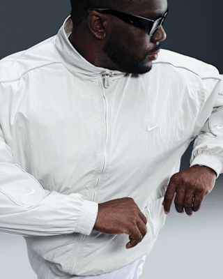 Nike Sportswear Solo Swoosh Men's Woven Track Jacket. Nike.com